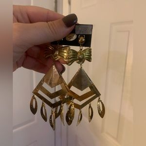 Gold now and triangle long statement earrings